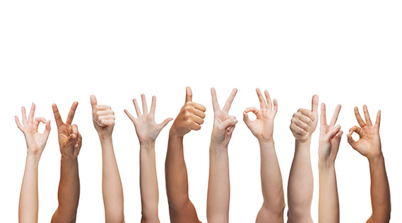 human hands showing thumbs up, ok and peace signs 713贵宾会检测线路(中国)股份有限公司